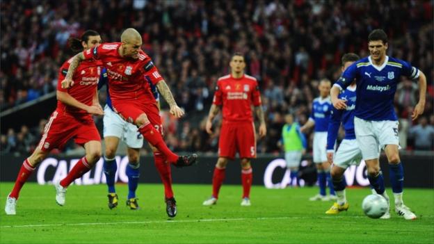 Martin Skrtel of Liverpool scores during the Carling Cup final match