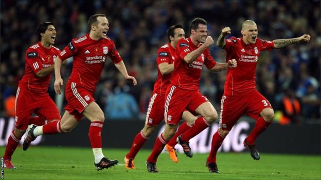Liverpool players celebrate winning the penalty shoot-out during the Carling Cup Final at Wembley Stadium