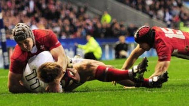 England wing David Strettle goes over the line but the try was not awarded