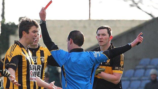 Stephen Kernan protests his innocence after being sent off by referee David Coldick in the All-Ireland semi-final