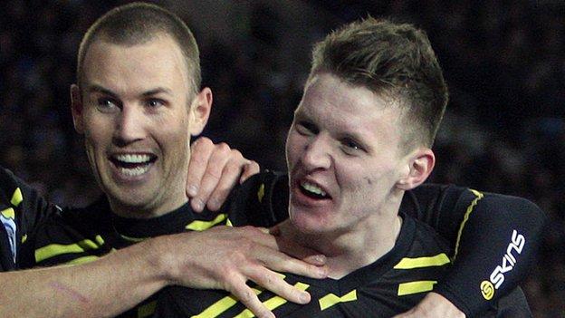 Joe Mason (right) celebrates with Kenny Miller after scoring against Brighton