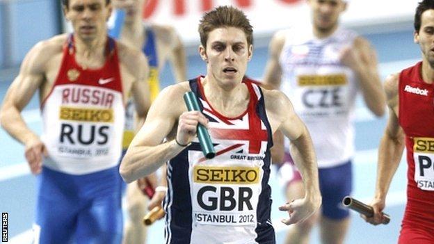 Richard Buck (centre) wins silver in the men's 4x400m relay at the 2012 World Indoor Championships