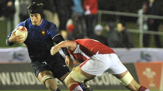Ieuan Jones tackles France's Julien Kazubek