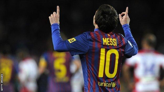 Lionel Messi celebrates after equalling Barcelona's 60-year-old goal-scoring record