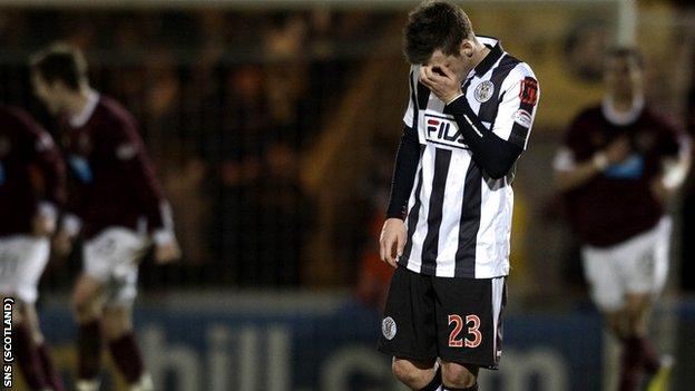 St Mirren's Graham Carey hangs his head at the final whistle, having missed an early penalty