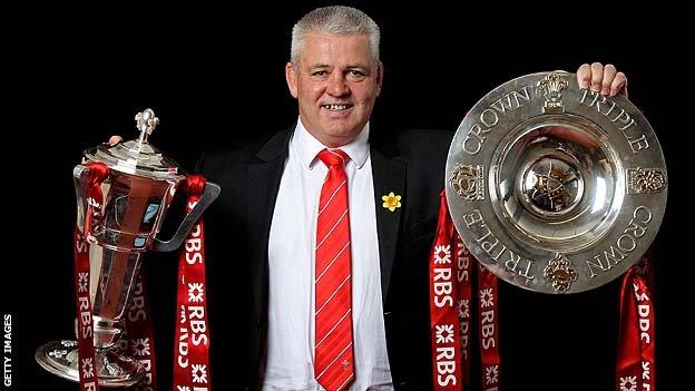 Warren Gatland with the 2012 Six Nations and Triple Crown trophies