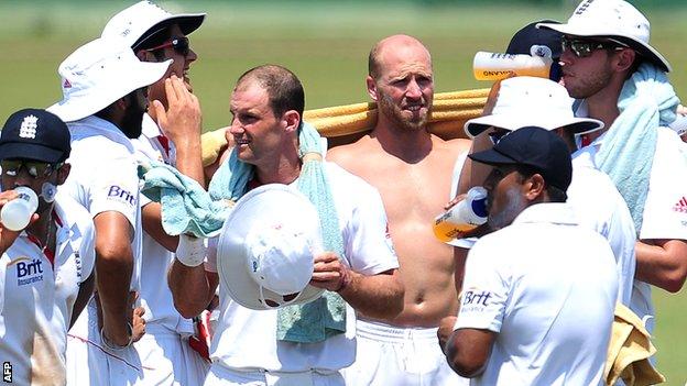 England players take a break during the tour match against the Sri Lankan development XI
