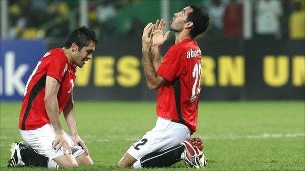 Mohamed Aboutrika - seen here celebrating Egypt's 2008 Nations Cup success - is back in the squad, but Ahmed Hassan (left) misses out
