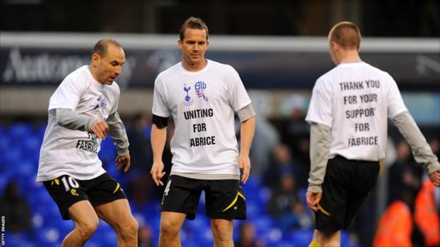 Bolton Wanderers' Kevin Davies (centre) and Martin Petrov (left) wearing T-shirts in support of team-mate Fabrice Muamba before the FA Cup sixth-round tie at White Hart Lane