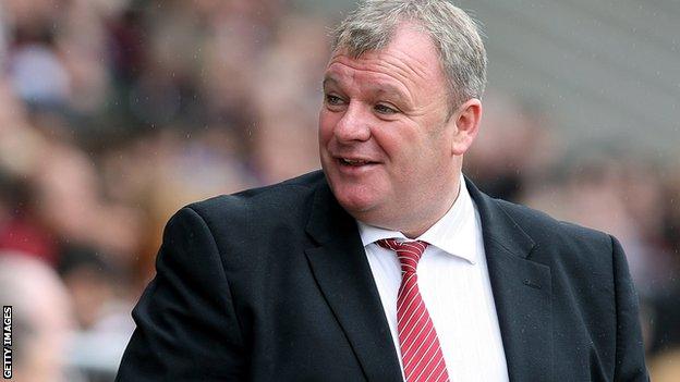 Rotherham manager Steve Evans arrives at Elland Road wearing