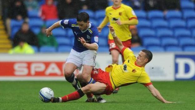 Craig Conway is challenged by Jonathan Hogg