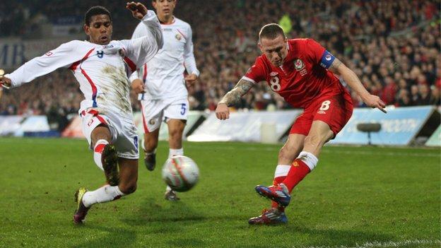 Craig Bellamy fires a shot against Costa Rica