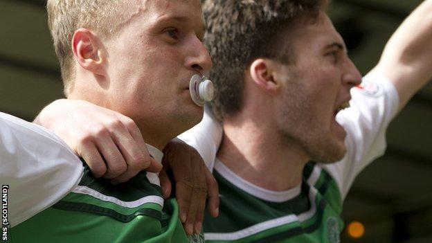 Griffiths (left) celebrates his winning goal against Aberdeen