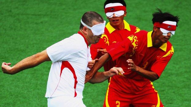 Dave Clarke challenges against China at the 2008 Paralympics