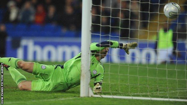 Derby keeper Frank Fielding is unable to stop Mark Hudson's goal for Cardiff