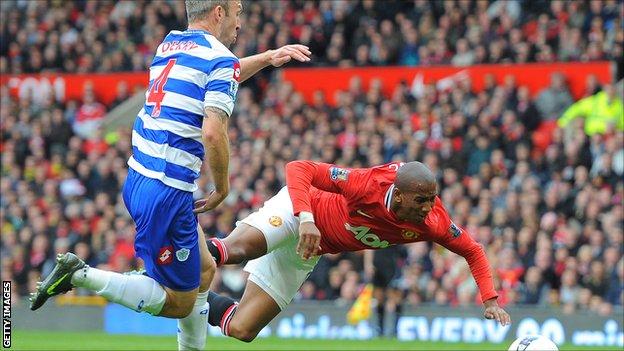 Manchester United's Ashley Young wins a penalty against QPR