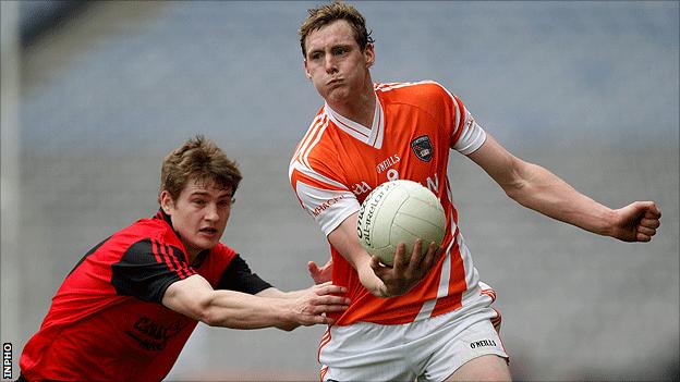 Down's Conor Maginn in action against Kieran Toner of Armagh