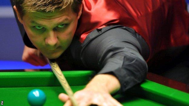 Ryan Day plays a shot in his win over Ding Junhui