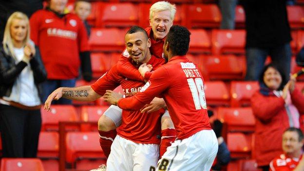 Barnsley's Craig Davies celebrates with team-mates David Perkins and Ricardo Vaz Te after scoring against Bristol City.