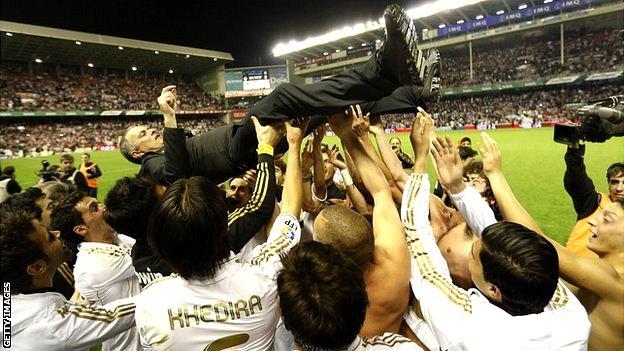 Jose Mourinho held aloft by Real Madrid players