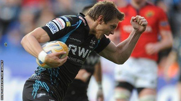 Ospreys fly-half Dan Biggar celebrates this try against Munster