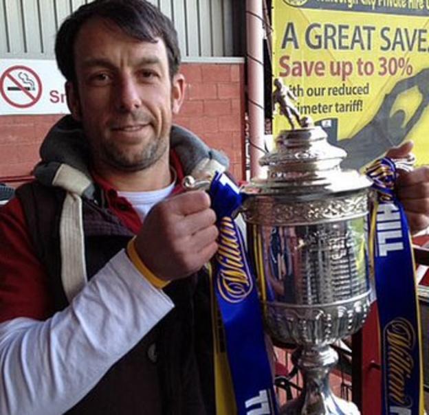 Simon Rennie poses with the Scottish Cup