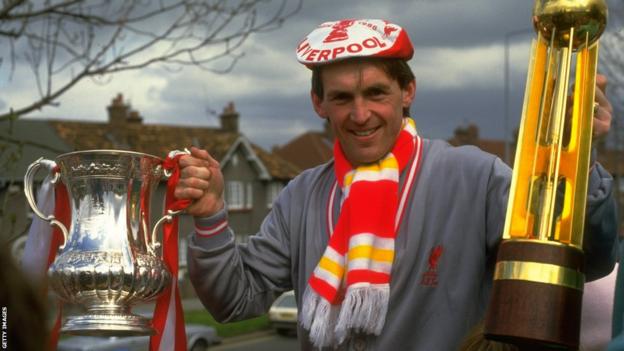 Dalglish with league and cup trophies