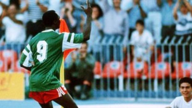 Roger Milla celebrates a goal at the 1990 World Cup