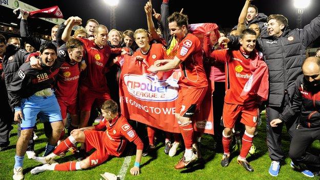 Crewe Alexandra players celebrate reaching Wembley