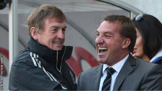 Liverpool boss Kenny Dalglish and Swansea manager Brendan Rodgers during their sides' Premier League encounter at Anfield