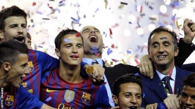 Pep Guardiola celebrates after his final game in charge of Barcelona.
