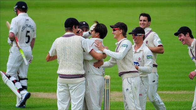 Somerset celebrate the wicket of Paul Collingwood