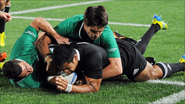 Julian Savea scores the second of his three tries in Auckland