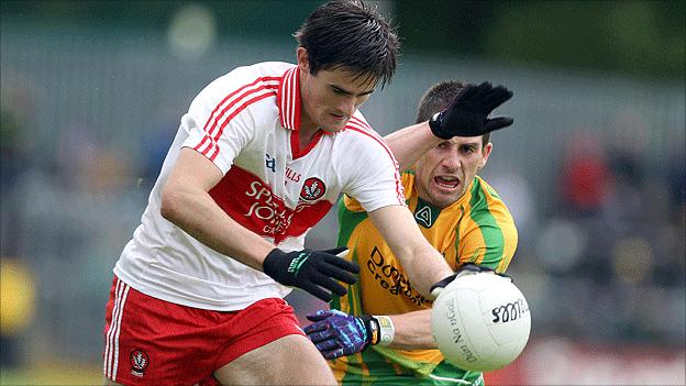 Chrissy McKaigue of Derry in action against Donegal's Paddy McGrath