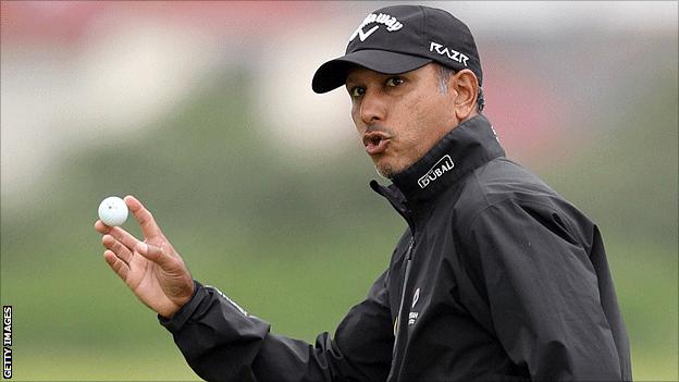 Jeev Mikha Singh of India acknowledges the crowd after a birdie on the 18th hole at Royal Portrush