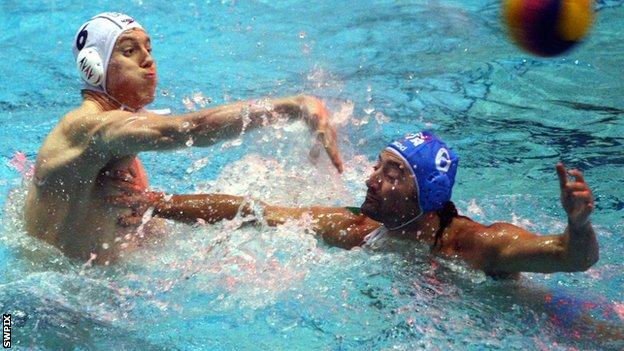 Joe O'Regan of Great Britain throws the ball