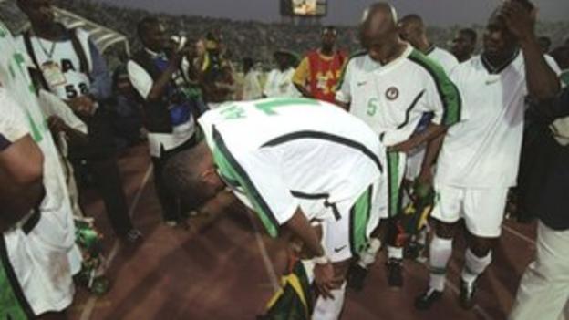 Nigerian players are distraught after their shoot-out loss in the 2000 Nations Cup final