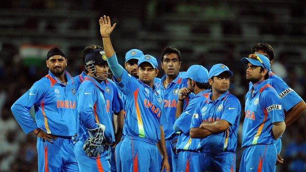 Indian cricket team await the decision of an umpire review