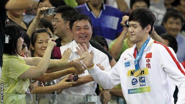 Sun Yang celebrates with Shanghai crowd after his world record