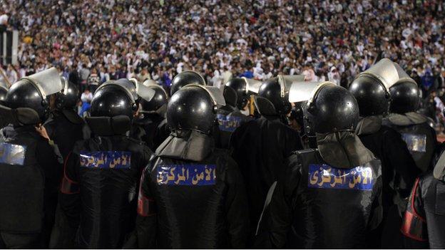 Egyptian police stand guard in Cairo stadium