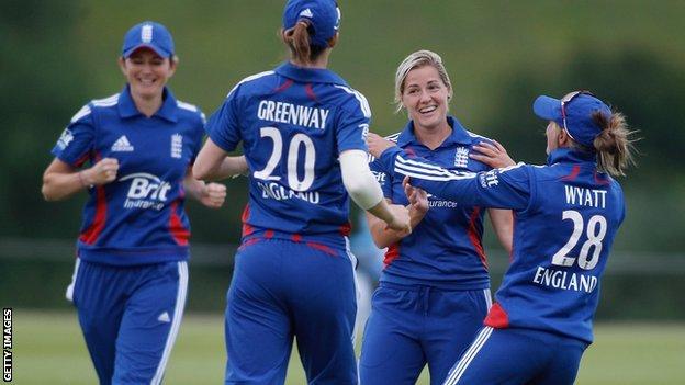 England celebrate a wicket by Katherine Brunt (second right)