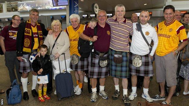 Motherwell fans gather at Glasgow Airport