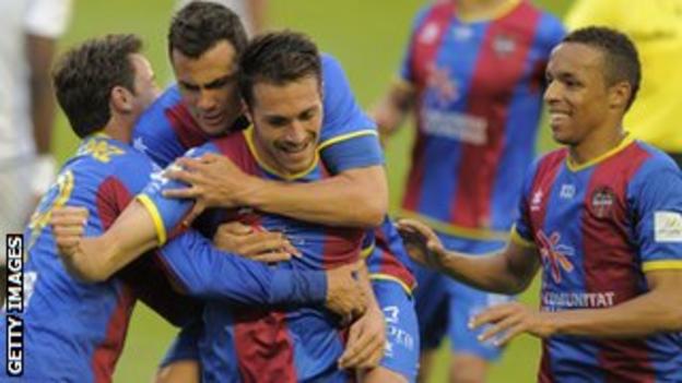 Xavi Torres (centre) celebrates scoring for Lavante last season