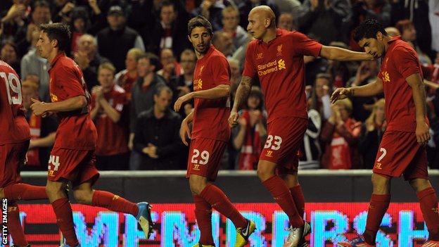Luis Suarez (right) scored Liverpool's equaliser at Anfield