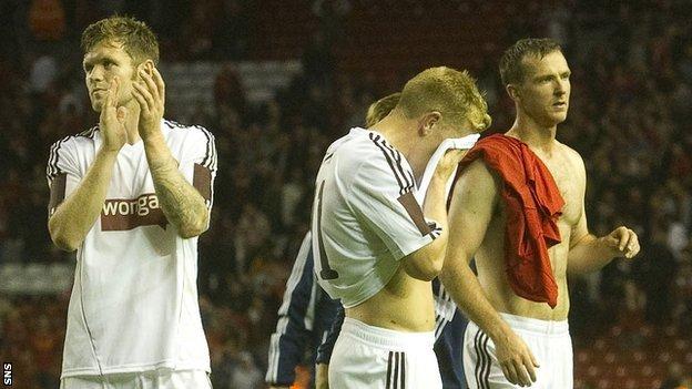Hearts players following the 2-1 aggregate defeat by Liverpool