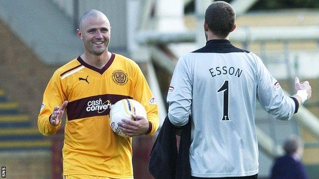 Motherwell forward Michael Higdon and Inverness goalkeeper Ryan Esson