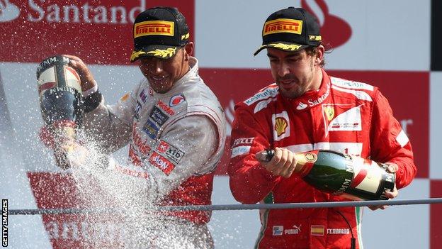 Lewis Hamilton (left) and Fernando Alonso after the Italian GP