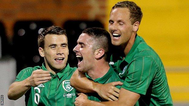 Robbie Brady (centre) celebrates after hitting the Republic's second goal at Craven Cottage