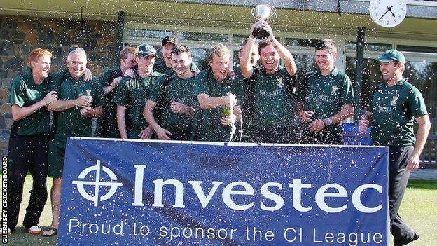 Argyll Investment celebrate winning the title