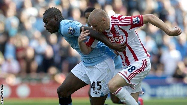 Mario Balotelli and Andy Wilkinson